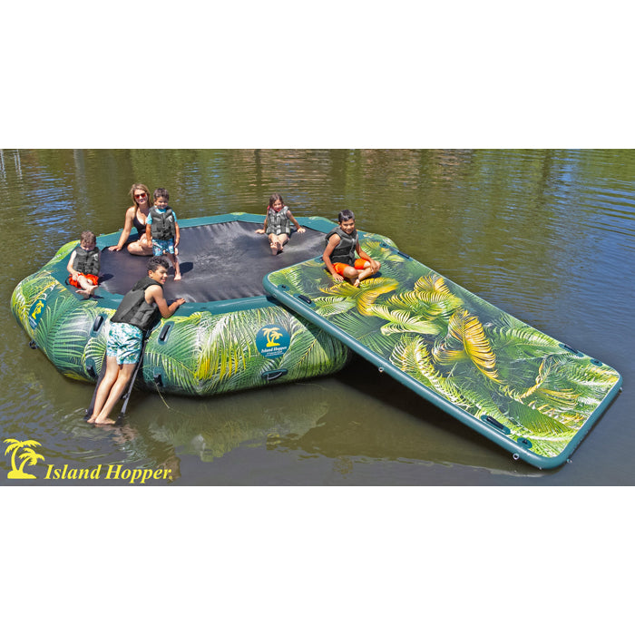 This is the Island Hopper 15ft Lakeside Series Water Bouncer solo with palm tree leaves as the design around it with the center forming a black decagon without the slide, only a black ladder on one side.