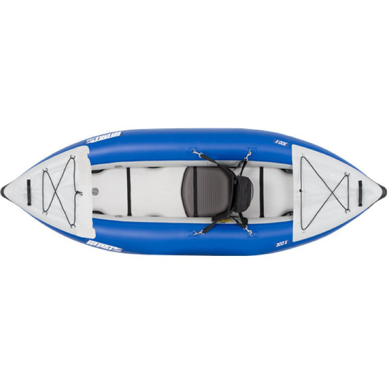 Blue and Grey Sea Eagle Explorer 300X Solo Inflatable Kayak top and side display view with the bag and pump sitting next to the Sea Eagle inflatable kayak. 