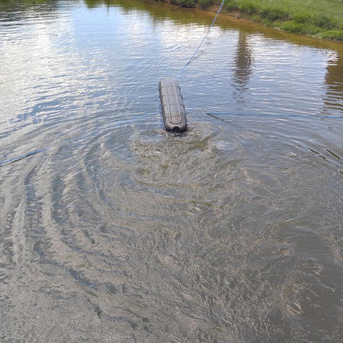 Bearon Aquatics FG1000 Flo-Gen Aerator for Sale.  The Power House FG1000 features a black plastic floatation device with a FG1000 Aerator for Sale attached underneath.  The white shroud and blue propeller are clearly in view.